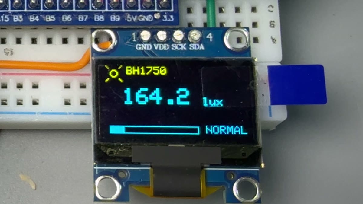 OLED 显示 164.2 lux 状态 NORMAL