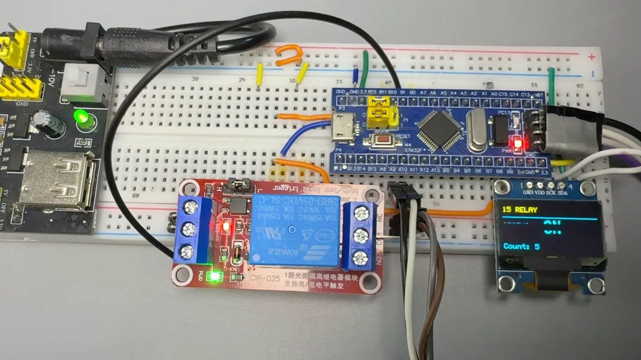 单路继电器、STM32F103C8T6 与 OLED 演示画面